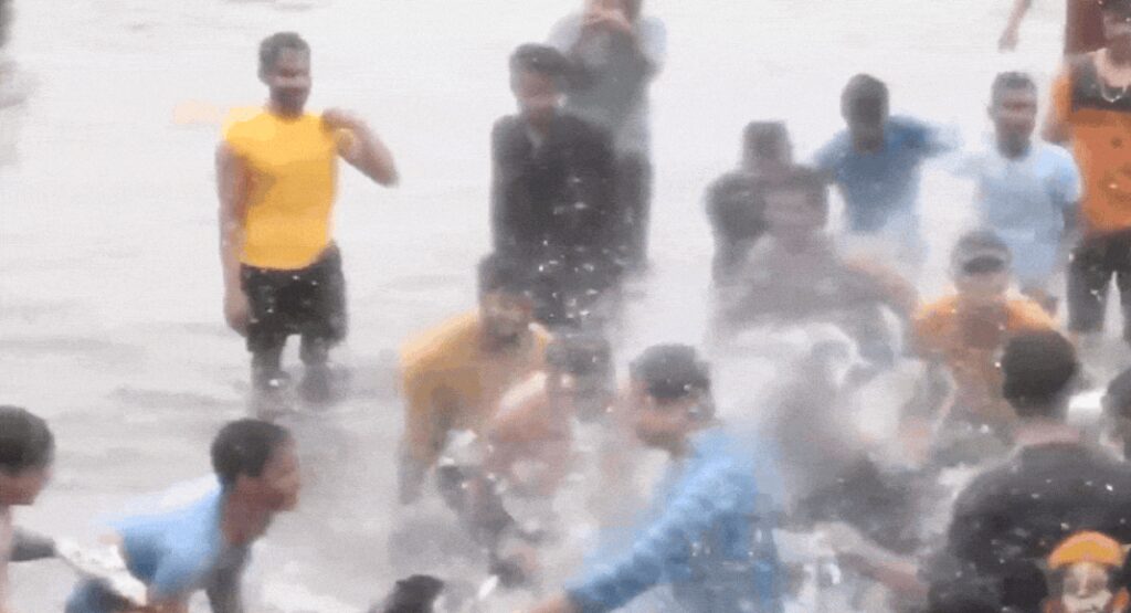 Video: Woman on bike harassed, groped by mob on flooded road in Lucknow | India News