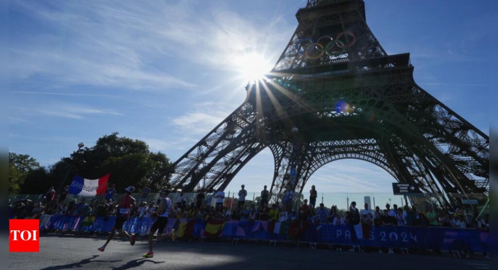 Eiffel Tower evacuated after man climbs up ahead of Paris Olympics closing ceremony