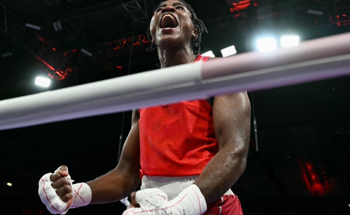 Boxer Cindy Ngamba Wins Refugee Olympic Team's First Medal Ever