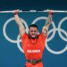 'Man From Mars' Karlos Nasar Wins Olympic Weightlifting Gold With New World Record